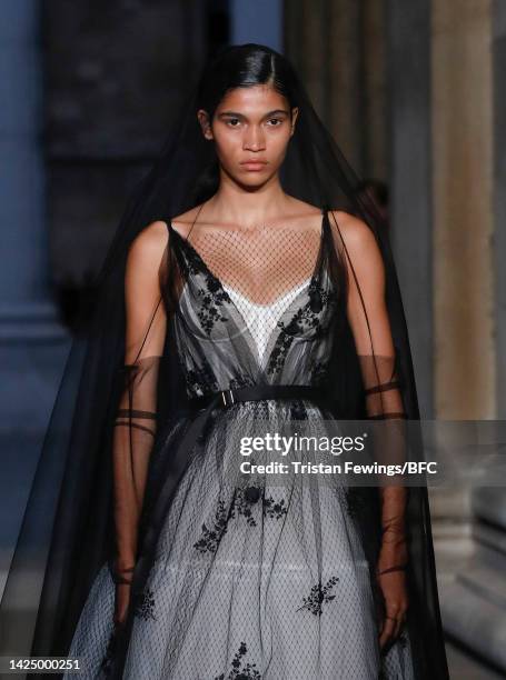 Model walks the runway at the Erdem show during London Fashion Week September 2022 on September 18, 2022 in London, England.