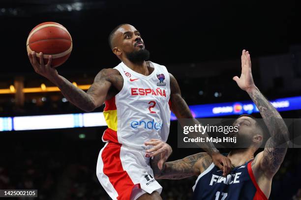 Lorenzo Brown of Spain drives to the basket as Vincent Poirier of France defends during the FIBA EuroBasket 2022 final match between Spain v France...
