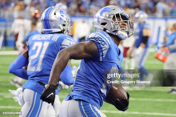 Will Harris of the Detroit Lions celebrates after making an interception against the Washington Commanders during the third quarter at Ford Field on...