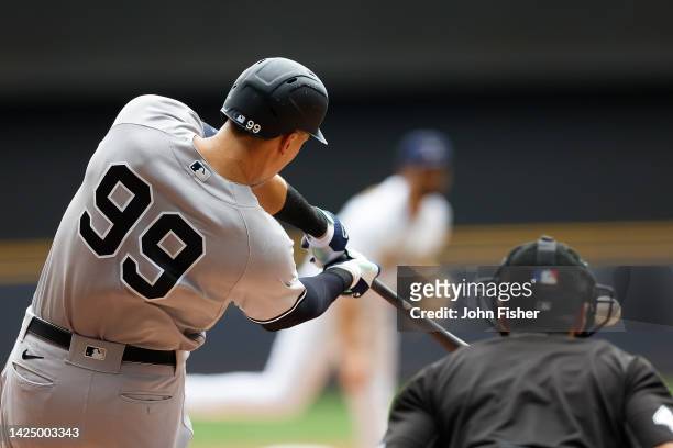 Aaron Judge of the New York Yankees hits a home run to right field in the third inning against the Milwaukee Brewers at American Family Field on...