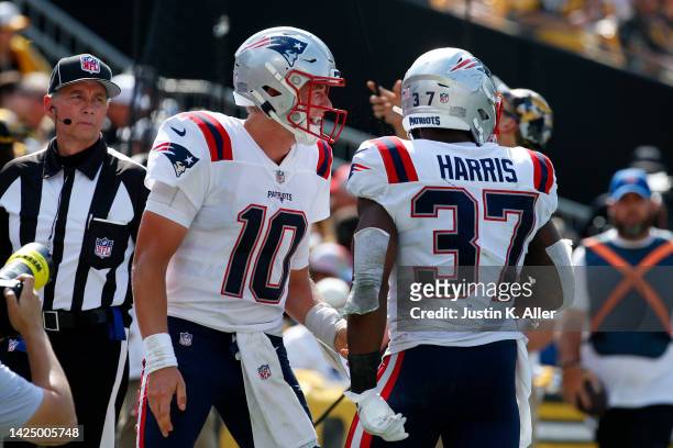 Damien Harris of the New England Patriots celebrates with Mac Jones after a touchdown during the second half in the game against the Pittsburgh...