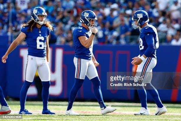Graham Gano of the New York Giants celebrates after making a field goal in the fourth quarter of the game against the Carolina Panthers at MetLife...