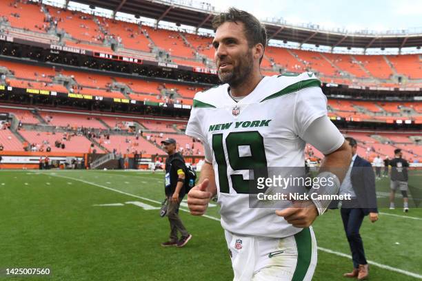 Joe Flacco of the New York Jets reacts as he runs off the field after their 31-30 win against the Cleveland Browns at FirstEnergy Stadium on...