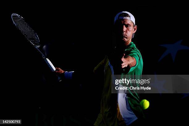 Matthew Ebden of Australia plays a forehand in his singles match against Suk-Young Jeong of Korea on day one of the Davis Cup Asia Oceania Zone...