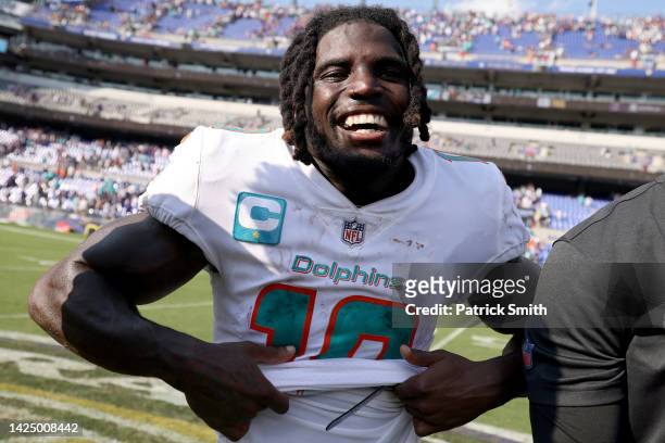 Tyreek Hill of the Miami Dolphins celebrates after a 42-38 win over the Baltimore Ravens at M&T Bank Stadium on September 18, 2022 in Baltimore,...