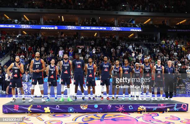 Silver Medallists France react on the podium following their defeat in the FIBA EuroBasket 2022 final match between Spain v France at EuroBasket...