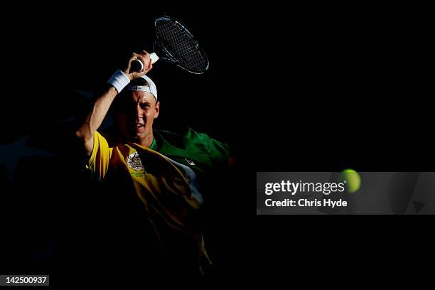 Matthew Ebden of Australia plays a forehand in his singles match against Suk-Young Jeong of Korea on day one of the Davis Cup Asia Oceania Zone...