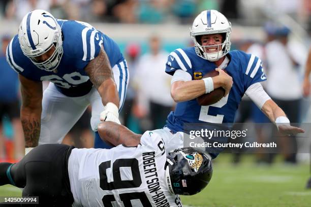 Roy Robertson-Harris of the Jacksonville Jaguars tackles Matt Ryan of the Indianapolis Colts in the fourth quarter at TIAA Bank Field on September...