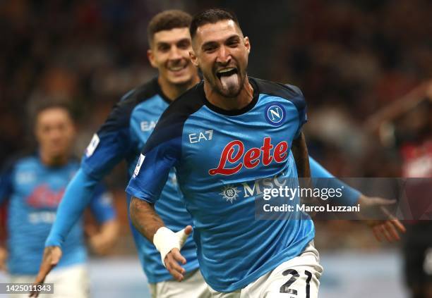 Matteo Politano of SSC Napoli celebrates after scoring their team's first goal from the penalty spot during the Serie A match between AC Milan and...