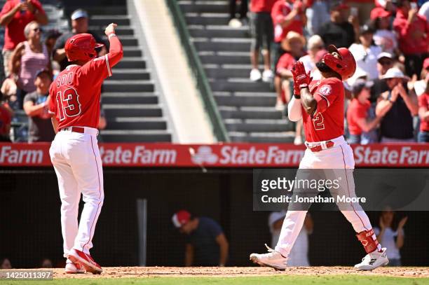 Luis Rengifo of the Los Angeles Angels of Anaheim celebrates after hitting a two run home run with Livan Soto in the third inning during a game...