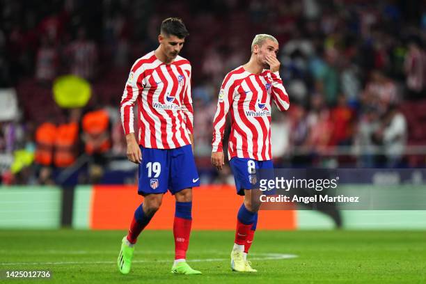 Alvaro Morata and Antoine Griezmann of Atletico de Madrid look dejected following their sides defeat in the LaLiga Santander match between Atletico...