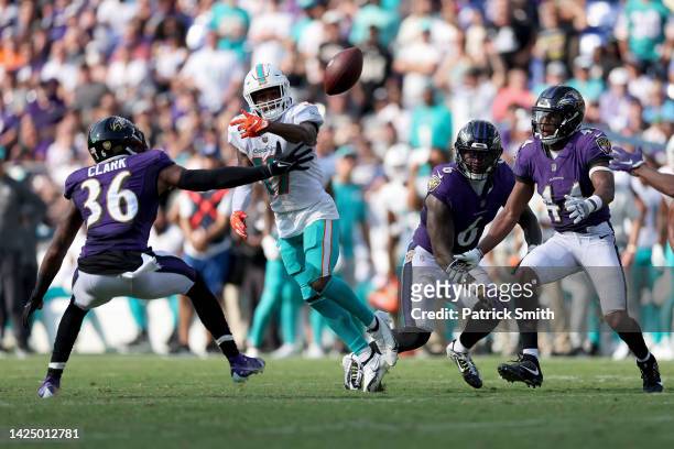 Chuck Clark of the Baltimore Ravens defends Jaylen Waddle of the Miami Dolphins in the second half at M&T Bank Stadium on September 18, 2022 in...