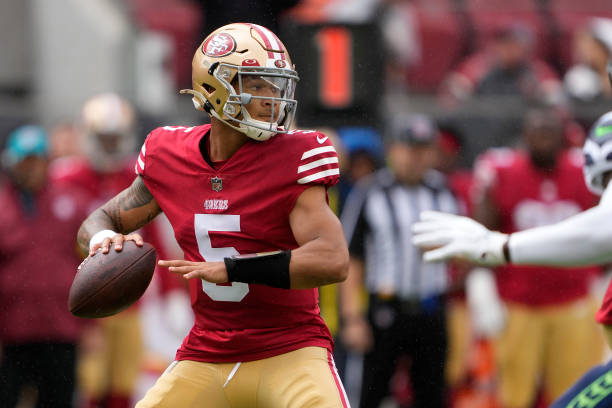 Trey Lance of the San Francisco 49ers looks to pass the ball against the Seattle Seahawks during the first quarter at Levi's Stadium