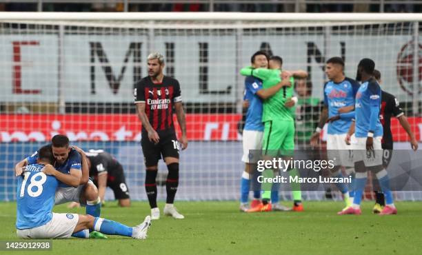 Giovanni Simeone and Giacomo Raspadori of SSC Napoli celebrate the victory at the end of the Serie A match between AC Milan and SSC Napoli at Stadio...