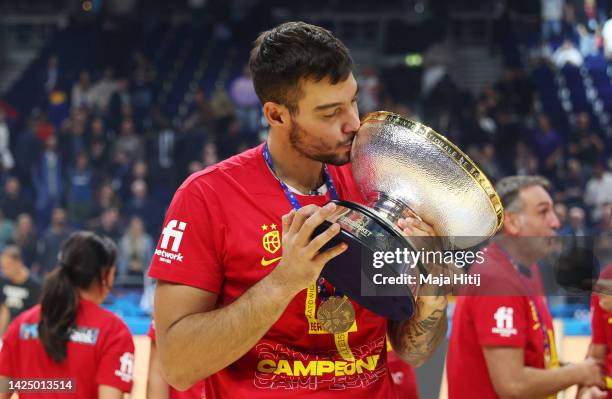 Willy Hernangomez of Spain kisses The Nikolai Semashko Trophy after being awarded player of the tournament following their side's victory in the FIBA...
