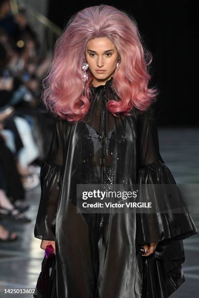 Model walks the runway during the Halpern Ready to Wear Spring/Summer 2023 fashion show as part of the London Fashion Week on September 18, 2022 in...