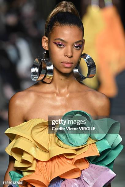 Model walks the runway during the Halpern Ready to Wear Spring/Summer 2023 fashion show as part of the London Fashion Week on September 18, 2022 in...