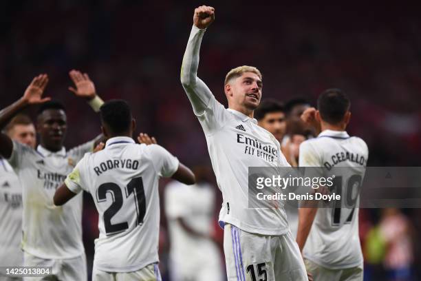 Federico Valverde of Real Madrid celebrates following their side's victory in the LaLiga Santander match between Atletico de Madrid and Real Madrid...