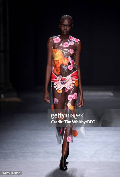 Model walks the runway at the Christopher Kane show during London Fashion Week September 2022 on September 18, 2022 in London, England.