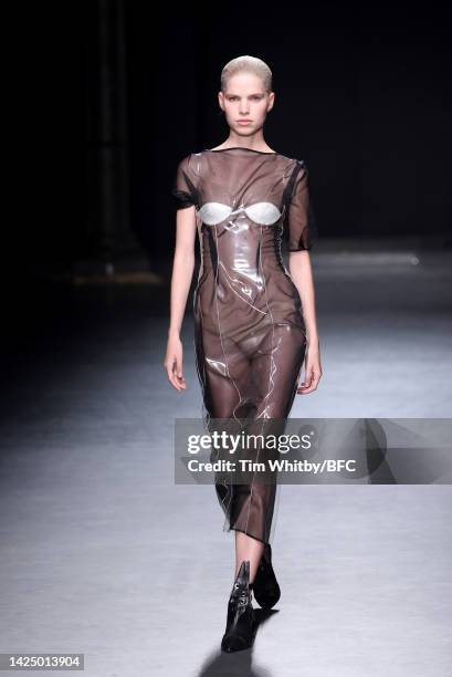 Model walks the runway at the Christopher Kane show during London Fashion Week September 2022 on September 18, 2022 in London, England.