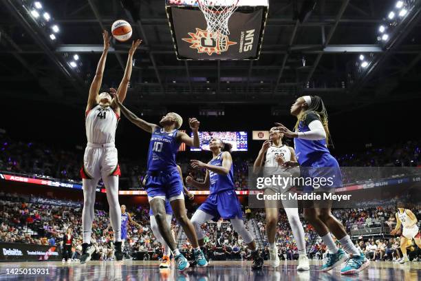 Kiah Stokes of the Las Vegas Aces rebounds the ball in the first half against the Connecticut Sun during game four of the 2022 WNBA Finals at Mohegan...