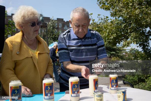 Holocaust survivors attend the Association of East European Jewry annual Holocaust Remembrance Day ceremony September 18, 2022 at the Sheepshead Bay...