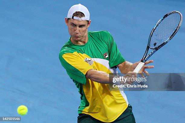 Matthew Ebden of Australia plays a backhand in his singles match against Suk-Young Jeong of Korea on day one of the Davis Cup Asia Oceania Zone...