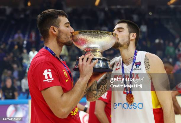 Willy Hernangomez and Juancho Hernangomez of Spain kiss The Nikolai Semashko Trophy following their side's victory in the FIBA EuroBasket 2022 final...