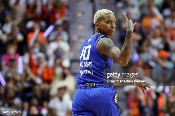Courtney Williams of the Connecticut Sun celebrates a three point basket in the second half against the Las Vegas Aces during game four of the 2022...