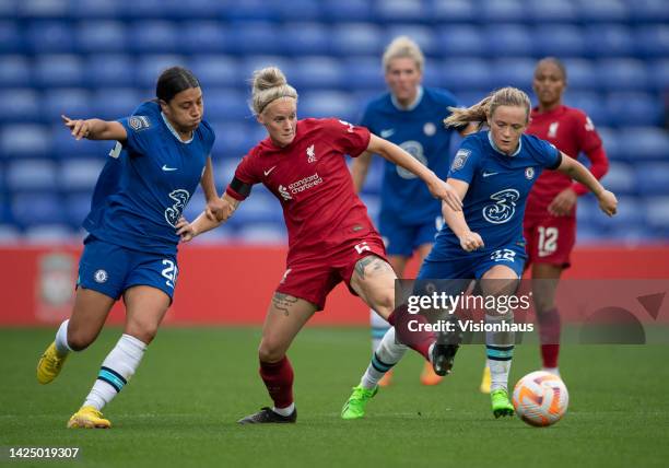 Jasmine Matthews of Liverpool in action with Sam Kerr and Erin Cuthbert of Chelsea during the FA Women's Super League match between Liverpool FC...