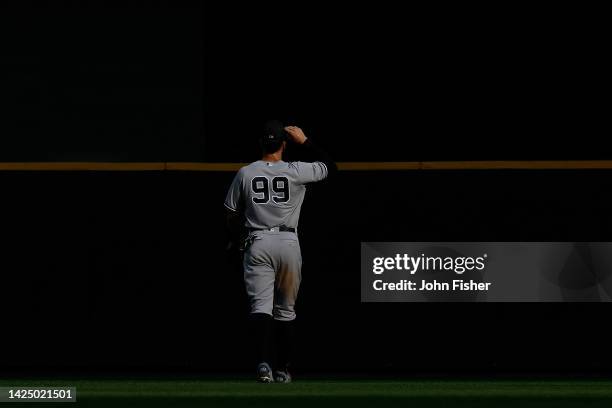 Aaron Judge of the New York Yankees walks out top center field in the ninth inning against the Milwaukee Brewers at American Family Field on...