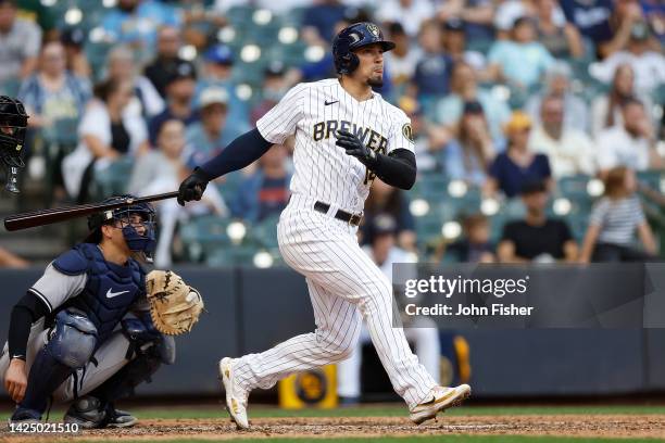 Jace Peterson of the Milwaukee Brewers doubles in two runs in the ninth inning against the New York Yankees at American Family Field on September 18,...