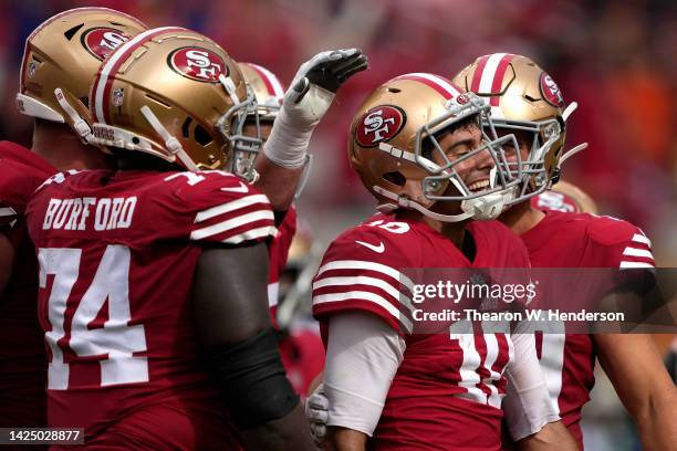 Jimmy Garoppolo of the San Francisco 49ers reacts after scoring a touchdown against the Seattle Seahawks during the fourth quarter at Levi's Stadium...