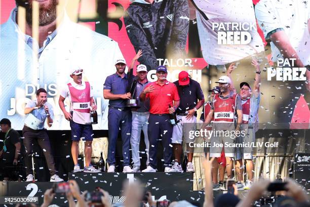 Team Captain Dustin Johnson of 4 Aces GC celebrates with teammates Pat Perez, Talor Gooch, and Patrick Reed after winning the team title during Day...