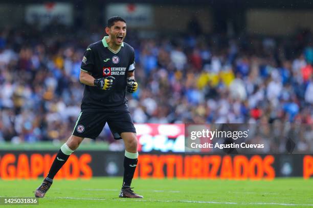 Jesus Corona of Cruz Azul celebrates the first goal of his team scored by teammate Rodrigo Huescas during the 15th round match between Pumas UNAM and...