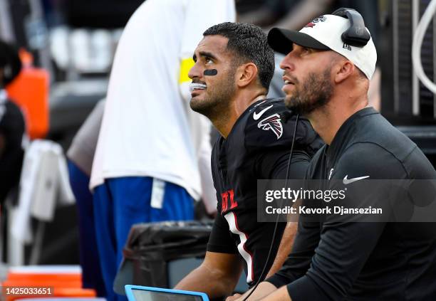 Marcus Mariota of the Atlanta Falcons looks up at the scoreboard during the fourth quarter of the game against the Los Angeles Rams at SoFi Stadium...