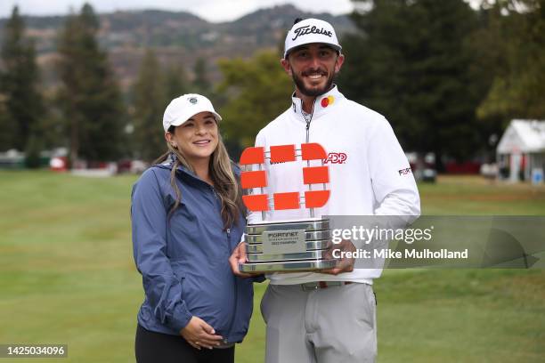 Max Homa of the United States celebrates with the trophy and his wife Lacey after winning the Fortinet Championship at Silverado Resort and Spa North...