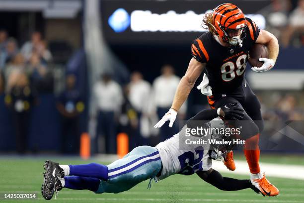 Hayden Hurst of the Cincinnati Bengals runs with the ball against Malik Hooker of the Dallas Cowboys during the second half at AT&T Stadium on...