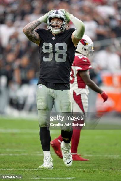Maxx Crosby of the Las Vegas Raiders reacts in the fourth quarter against the Arizona Cardinals at Allegiant Stadium on September 18, 2022 in Las...