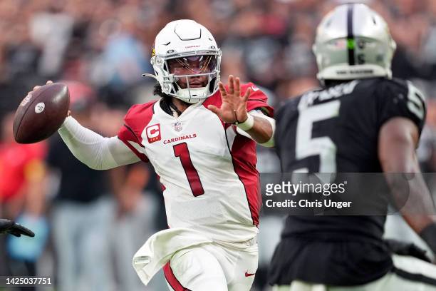 Kyler Murray of the Arizona Cardinals throws a pass for a two-point conversion in the fourth quarter against the Las Vegas Raiders at Allegiant...