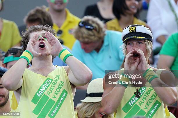 Australian fans cheer during day one of the Davis Cup Asia Oceania Zone Second Round tie between Australia and Korea at Pat Rafter Arena on April 6,...