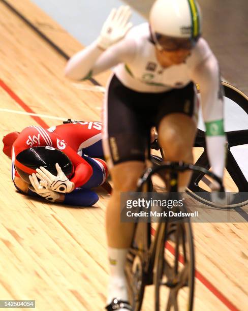 Victoria Pendleton of Great Britain crashes in her Womens Sprint Semifinals race with Anna Meares of Australia during day three of the 2012 UCI Track...