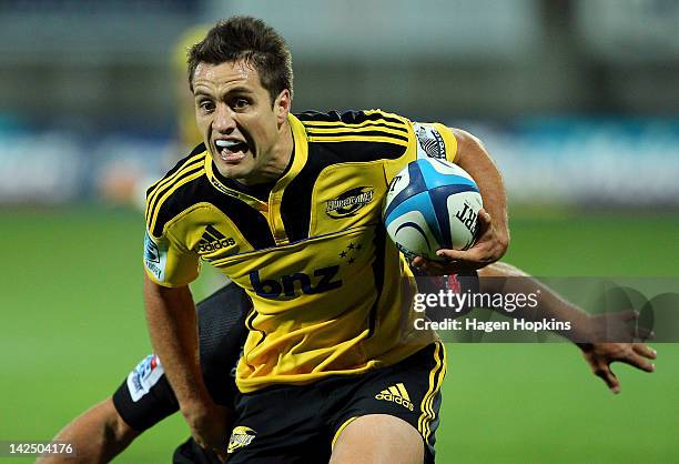 Tim Bateman of the Hurricanes runs in for a try during the round seven Super Rugby match between the Hurricanes and the Sharks at Yarrow Stadium on...