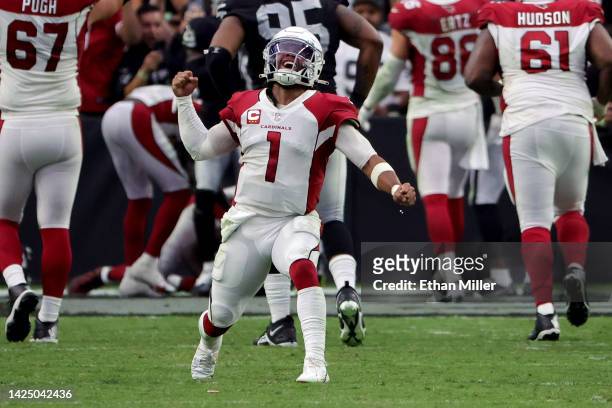 Kyler Murray of the Arizona Cardinals celebrates throwing a two-point conversion with no time left on the clock against the Las Vegas Raiders in the...