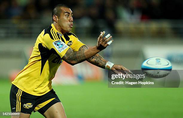 Tusi Pisi of the Hurricanes passes during the round seven Super Rugby match between the Hurricanes and the Sharks at Yarrow Stadium on April 6, 2012...