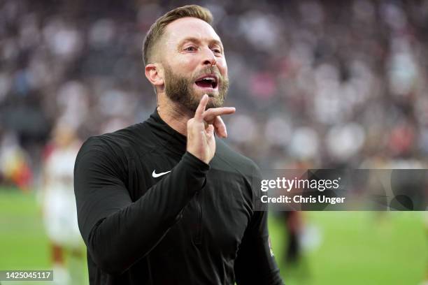 Arizona Cardinals head coach Kliff Kingsbury reacts after a 29-23 win in overtime against the Las Vegas Raiders at Allegiant Stadium on September 18,...