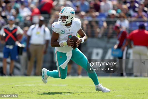 Quarterback Tua Tagovailoa of the Miami Dolphins throws a second half pass against the Baltimore Ravens at M&T Bank Stadium on September 18, 2022 in...