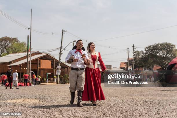 gaucho couple at the farroupilha camp - gaucho stock pictures, royalty-free photos & images