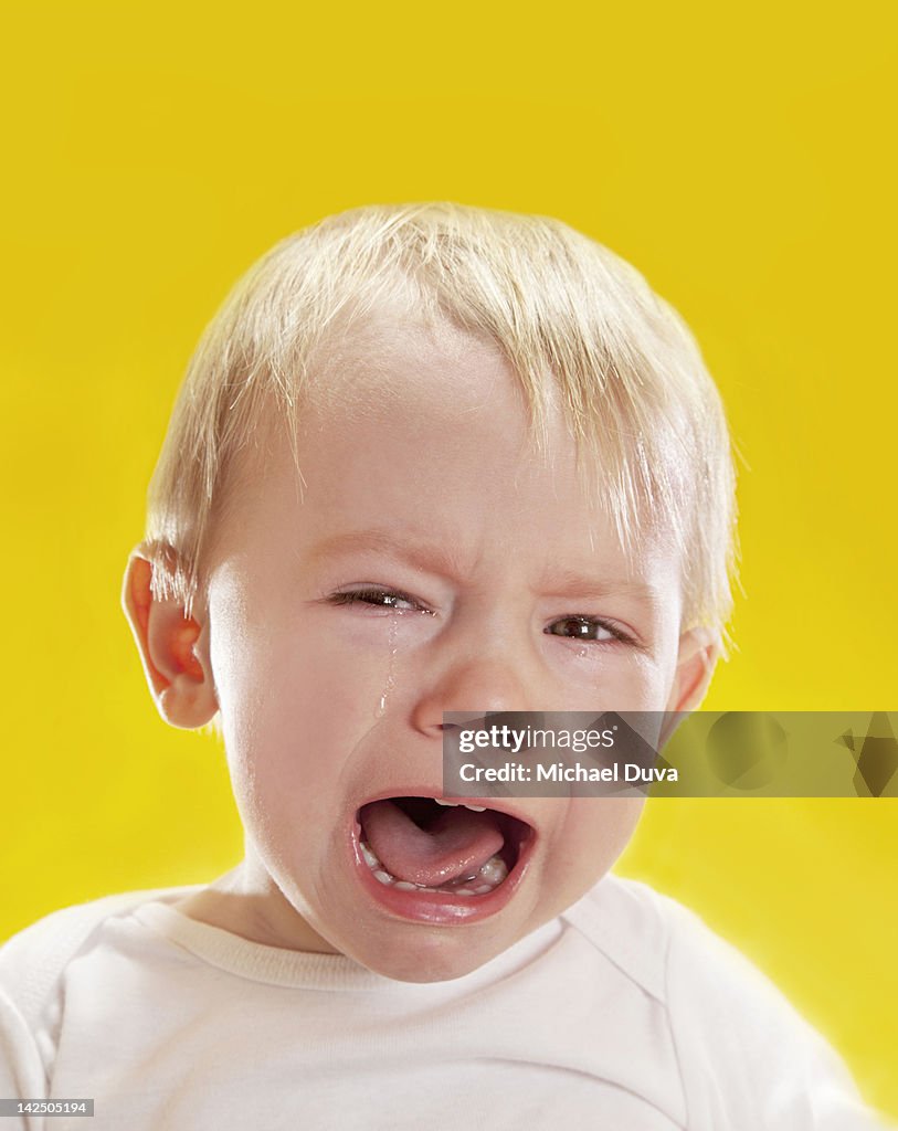 Studio shot of a child crying