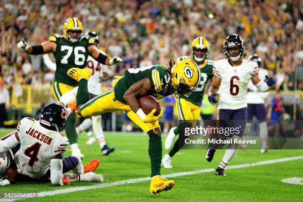 Aaron Jones of the Green Bay Packers scores a touchdown during the second quarter in the game against the Chicago Bears at Lambeau Field on September...